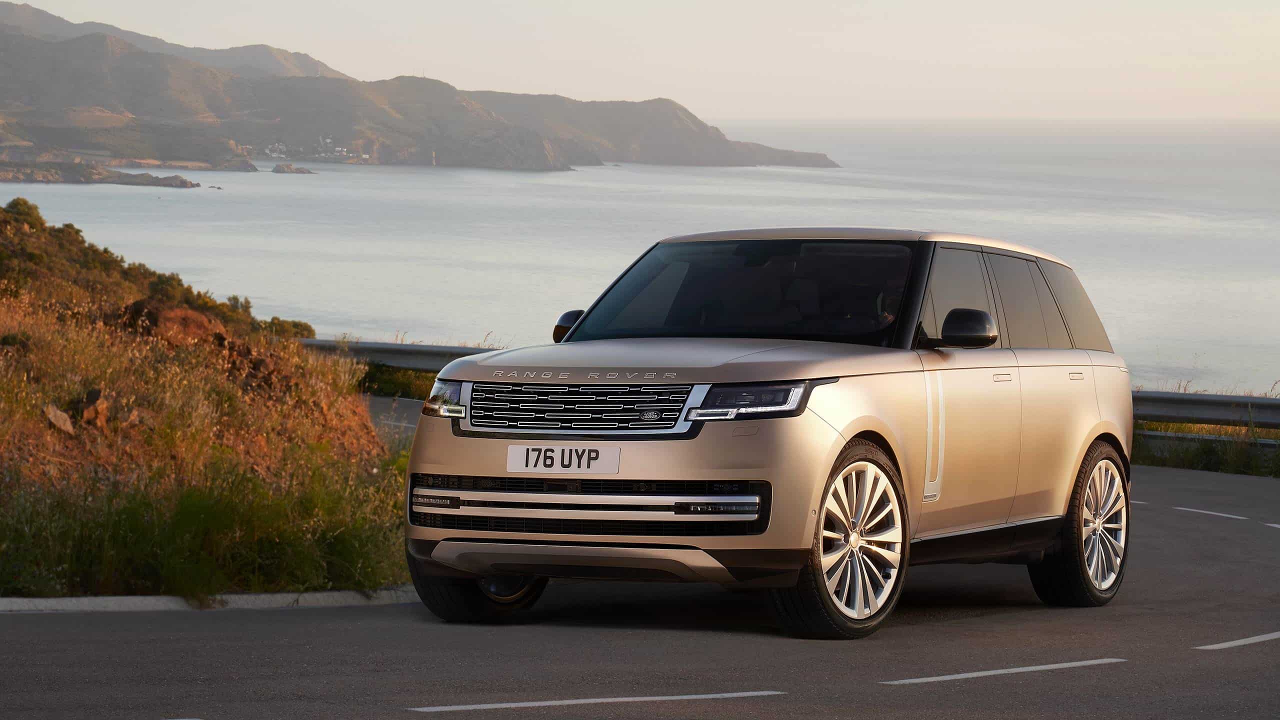 The New Range Rover driving along a coastal road