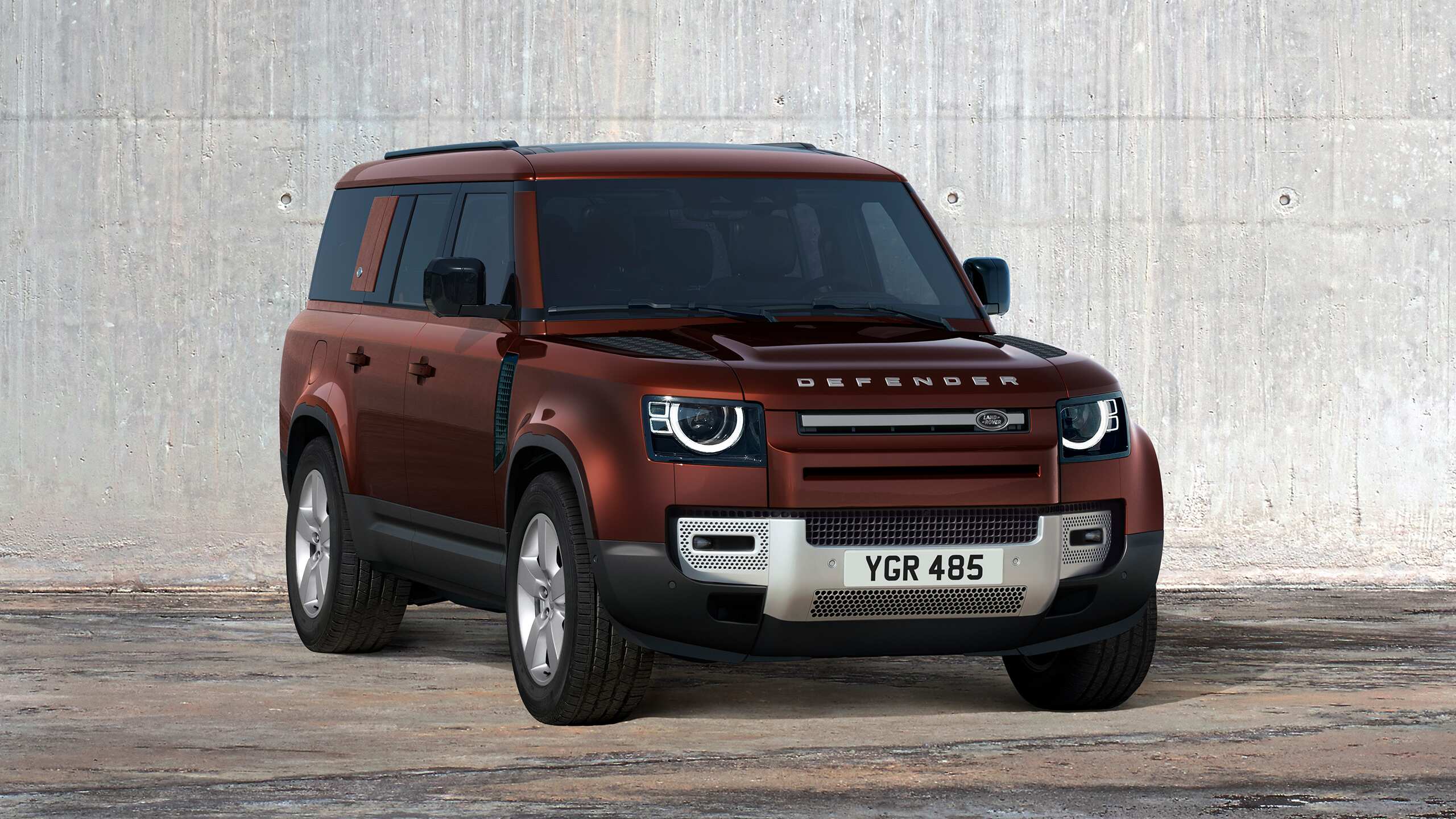 Representation of Defender on grey textured background