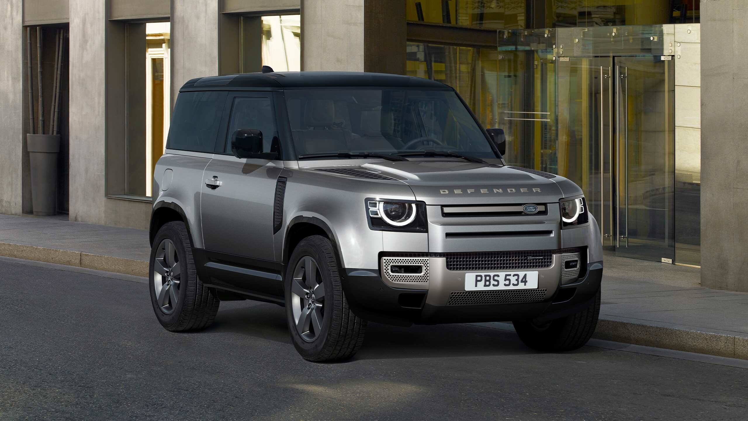 Defender Parked In Front Of Building