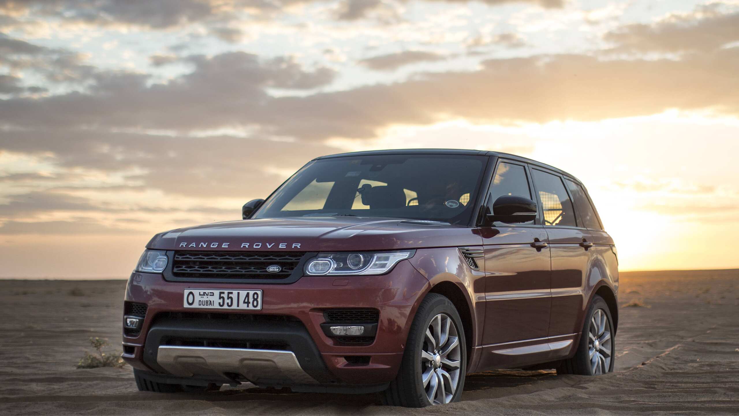 Range Rover Sport near the sunset