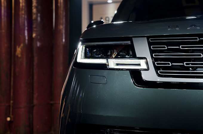 Close up shot of the front right headlight of the New Range Rover