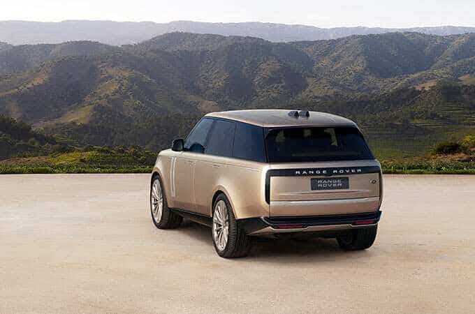 Rear image view of the New Range Rover with hills in the background