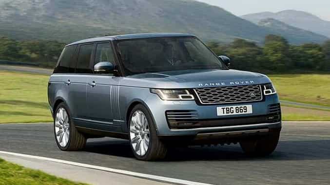 Range Rover in grey driving 
