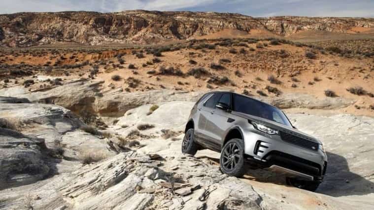 Land Rover Discovery parked on rock
