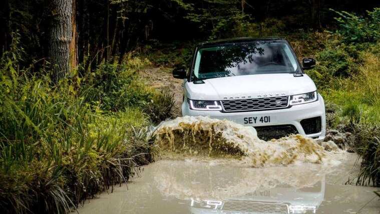 New Range Rover driving through river