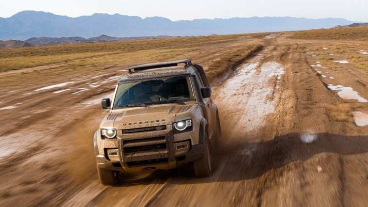 Land Rover Defender driving in mud