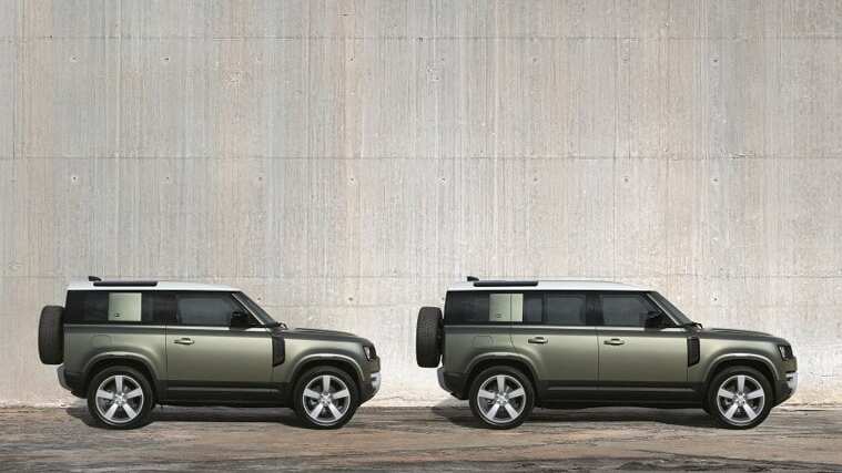 two Land Rover Defender models side view