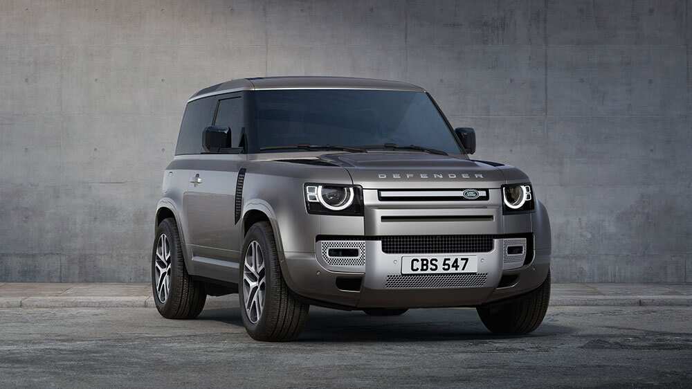 Land Rover Defender in silver front side view