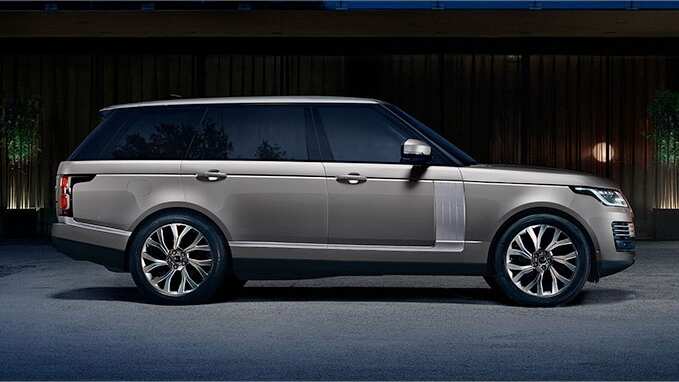 New Range Rover in beige side view