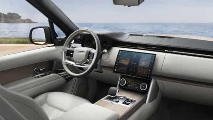 Interior dashboard in silver of a Land Rover Discovery vehicle