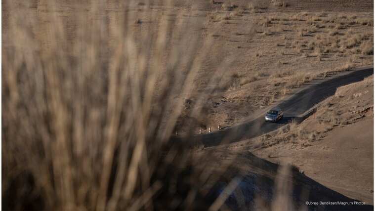 Land Rover Vehicle driving on road