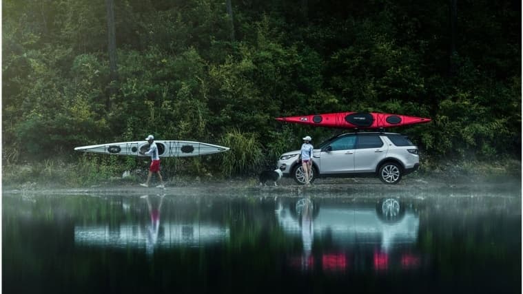 Land Rover by a lake