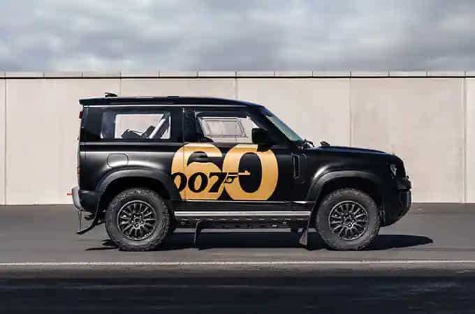 Side view of Special Painted Version Of Land Rover Defender 90 In Black And Gold