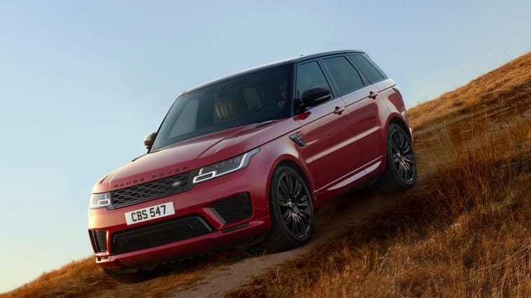Range Rover Sport driving down hill
