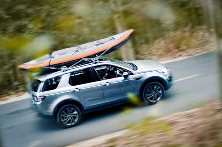 Land Rover Discovery with boat attached