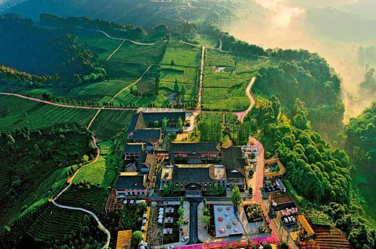 Aerial view of buildings in mountain landscape