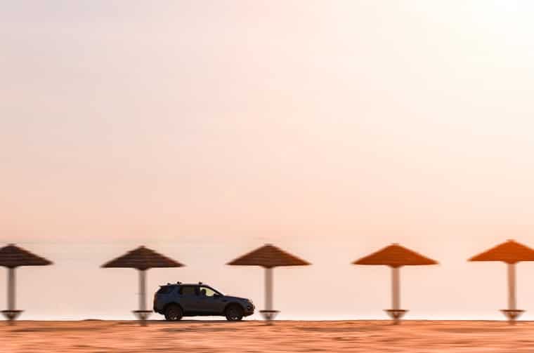 Land Rover Discovery Sport driving on beach