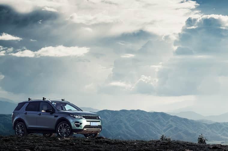 Land Rover Discovery Sport parked on mountainous terrain