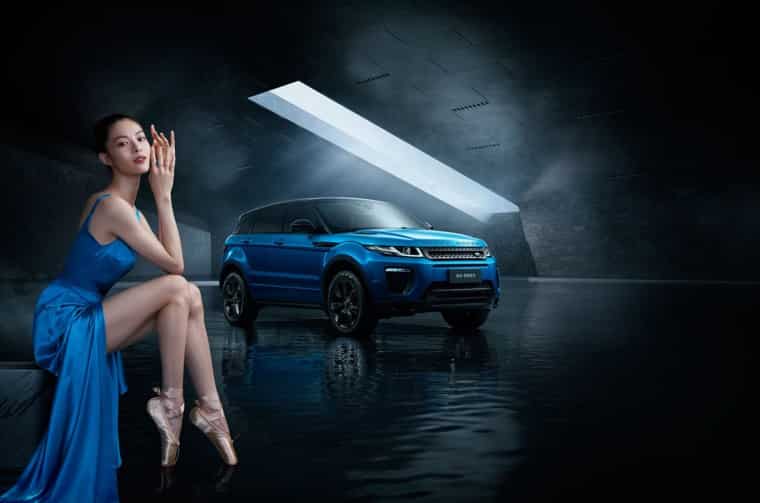 Zhong Chuxi in front of Range Rover Evoque