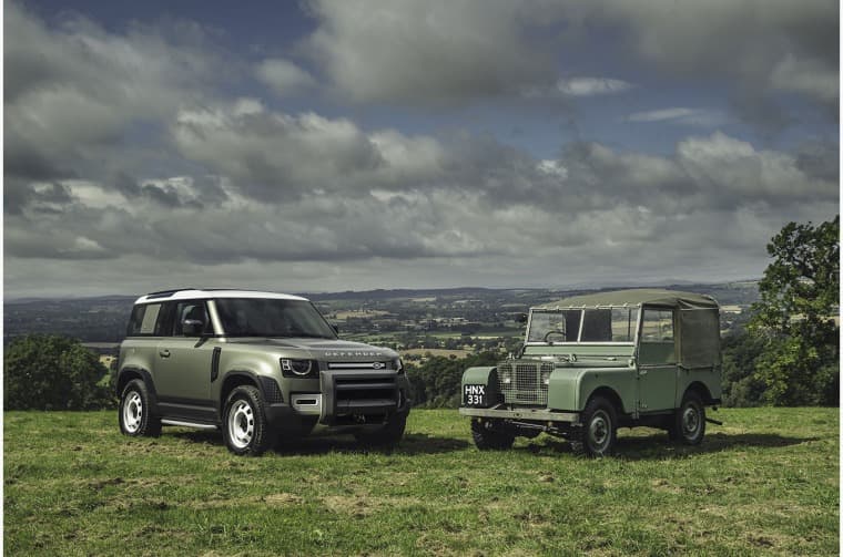 New Land Rover Defender next to Classic Land Rover Series I