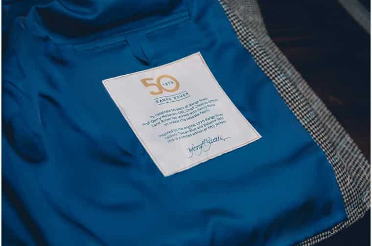 Close up of Range Rover 50 Years label inside Henry Poole jacket