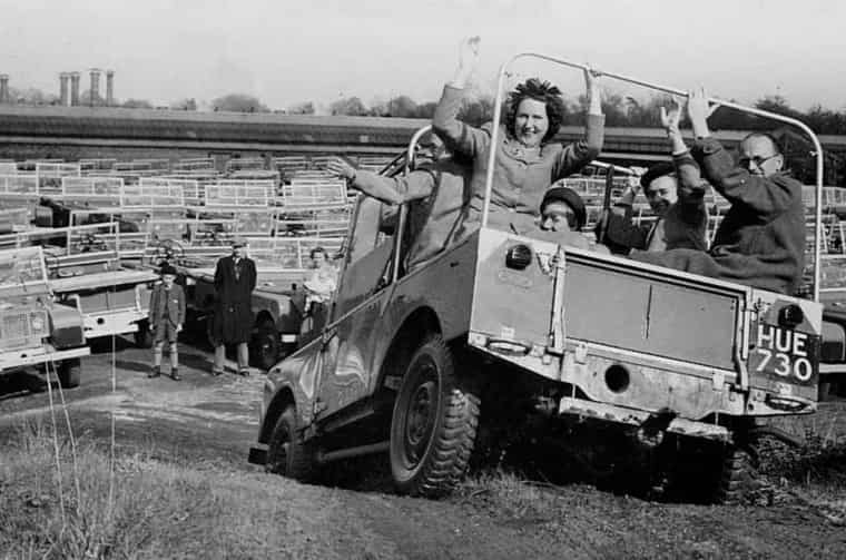 Vintage photo of Classic Land Rover driving off-road