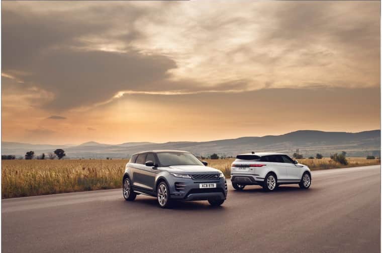 Two Range Rover Evoque vehicles parked on roadside