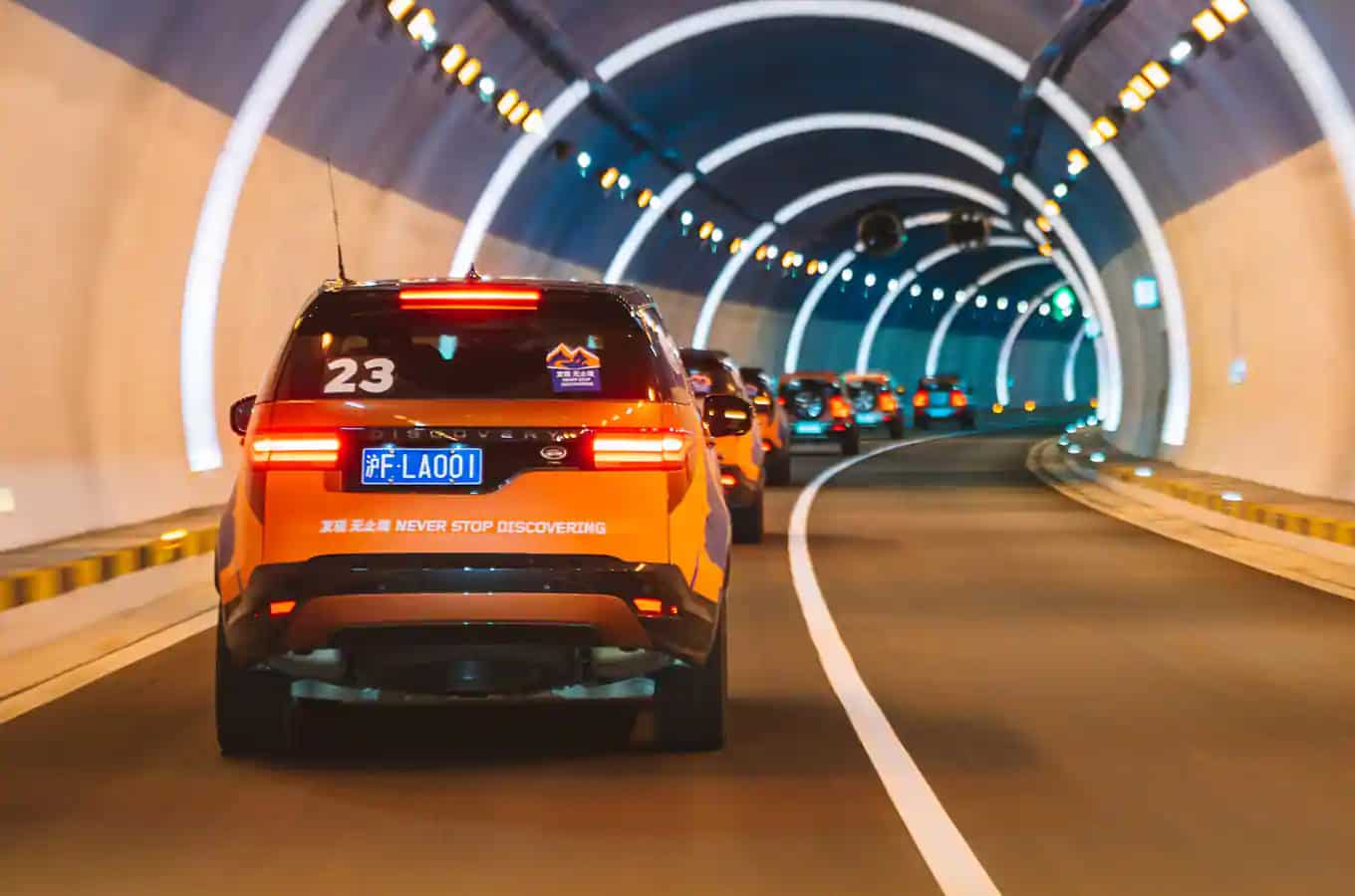 Land Rover Convoy driving through tunnel