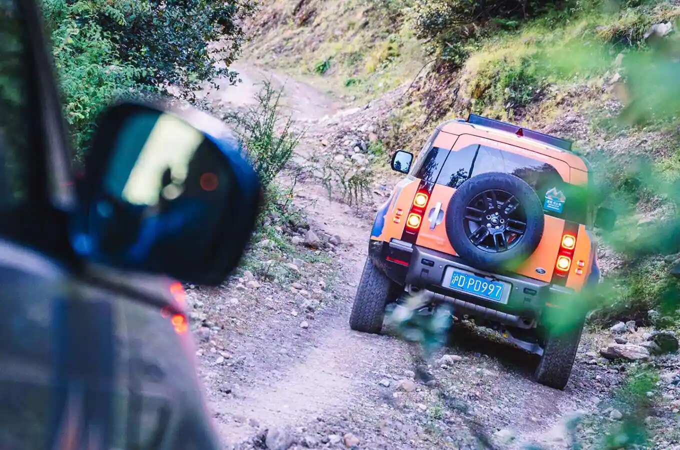 Land Rover Defender Driving on dirt road