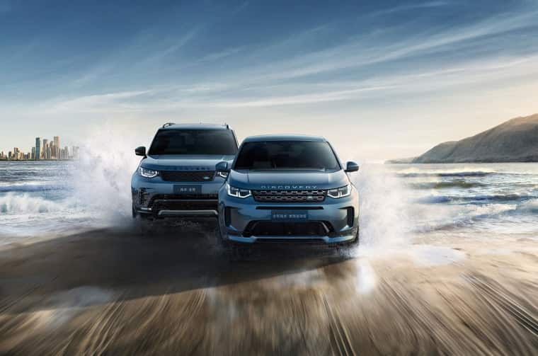 Land Rover Discovery and Discovery Sport driving through water