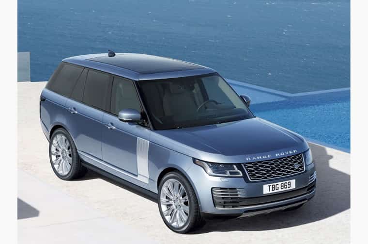 New Range Rover parked by sea