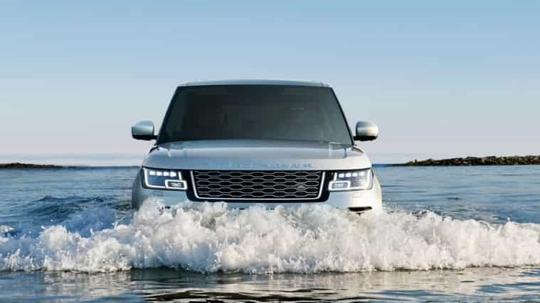 Range Rover driving through water
