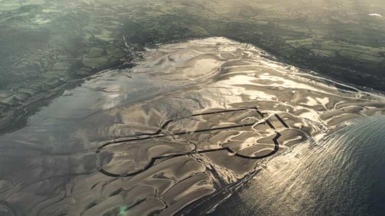 Aerial View of Red Dock Bay, Anglesey, England of Land Rover Defender Silhouette