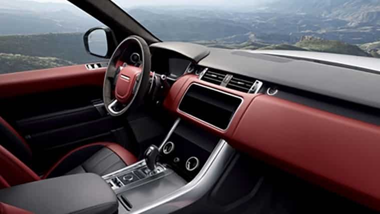 The red upholstered interior of a Range Rover vehicle