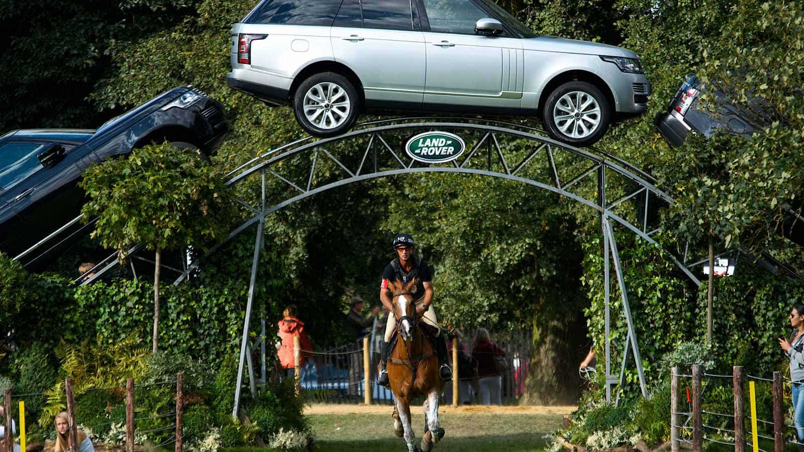 Equestrian riding underneath Land Rover arch